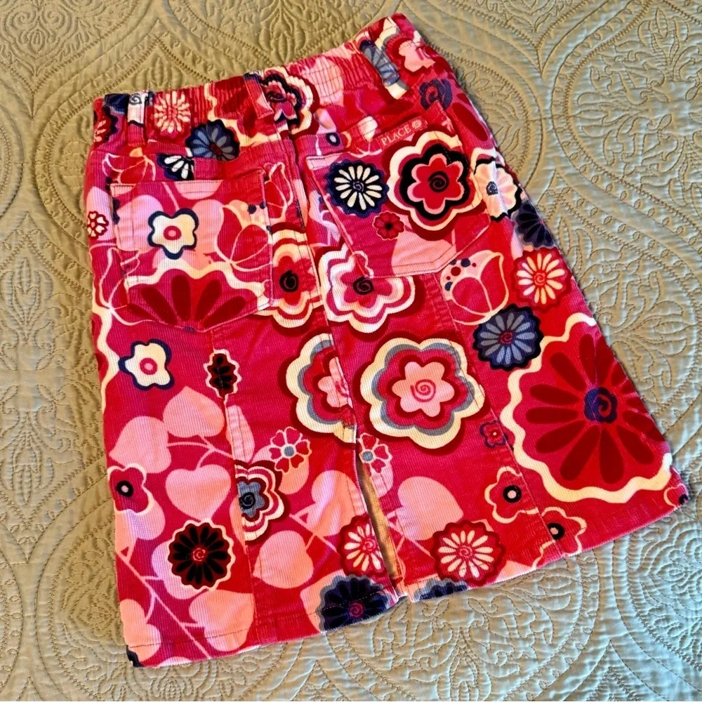 The Children’s Place corduroy skirts size 4. One Red and one pink multi.